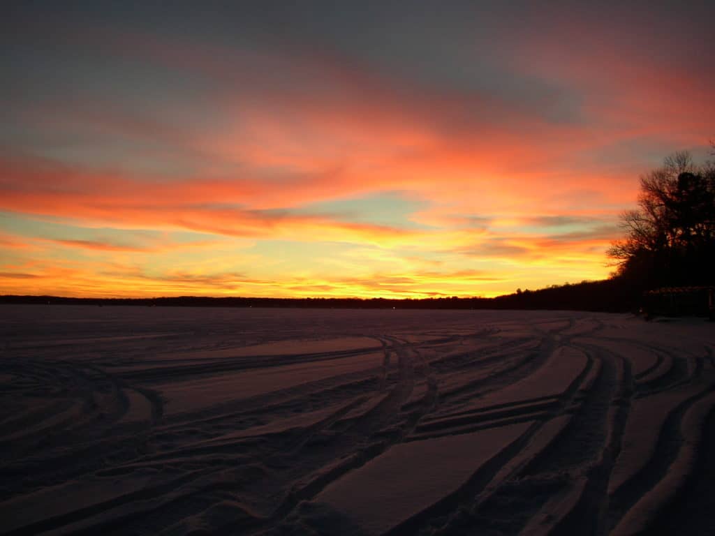 Sunset Over Frozen Lake